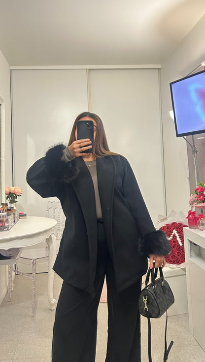 Manteau mi long manche fourrure